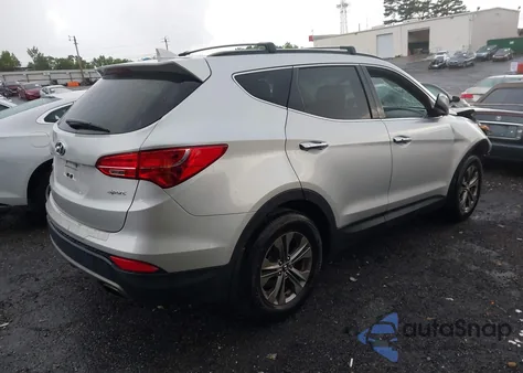 2014 Hyundai Santa Fe Sport 2.4L z USA, uszkodzony, nr VIN 5XYZU3LB5EG201355
